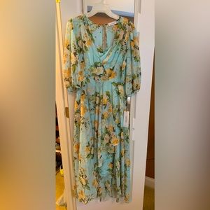 New Calvin Klein Dress with layered bottom hem.